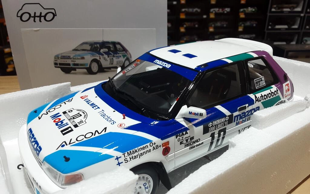 OTTO MOBILE 1/18 - MAZDA 323 GTX GR.A - Nº 10 RALLY 1000 LA OTTO MOBILE 1/18 - MAZDA 323 GTX GR.A - Nº 10 RALLY 1000 LA