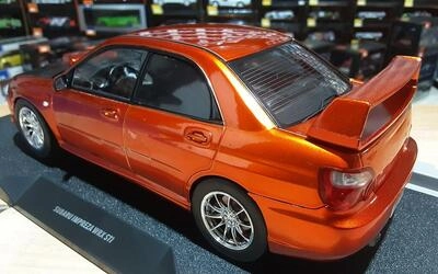 SOLIDO 1/18 - SUBARU IMPREZA WRX STII - 2003 - METALLIC ORAN